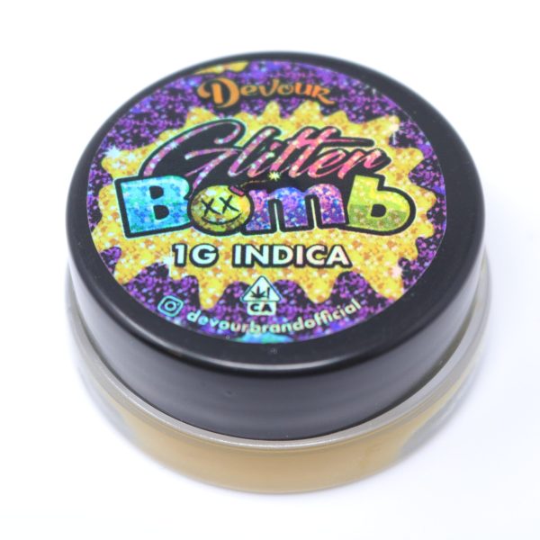 About devourbadderglitterbomb1 600x600